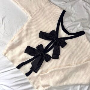 Cream Tie Front V-Neck Sweater with Black Bow Accents